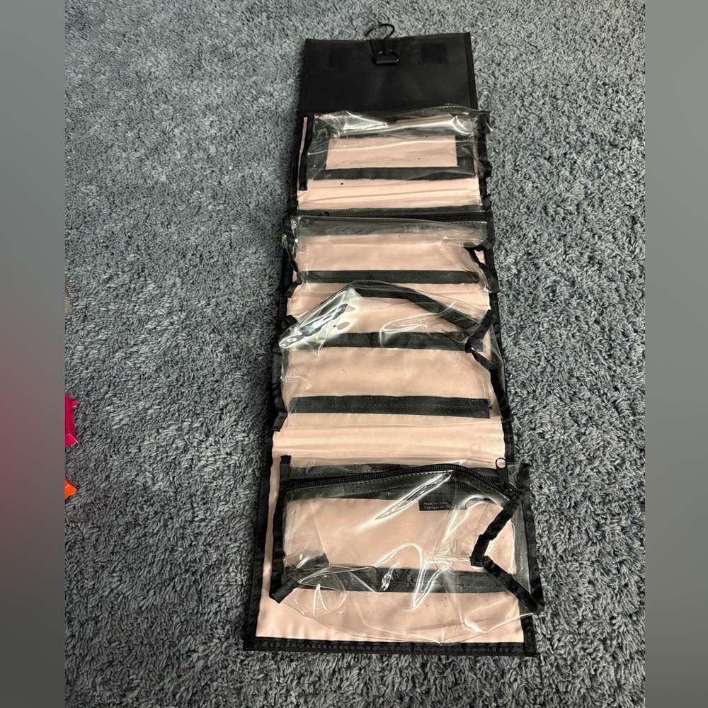 Lightly used Mary Kay travel makeup pouches that can also hang up